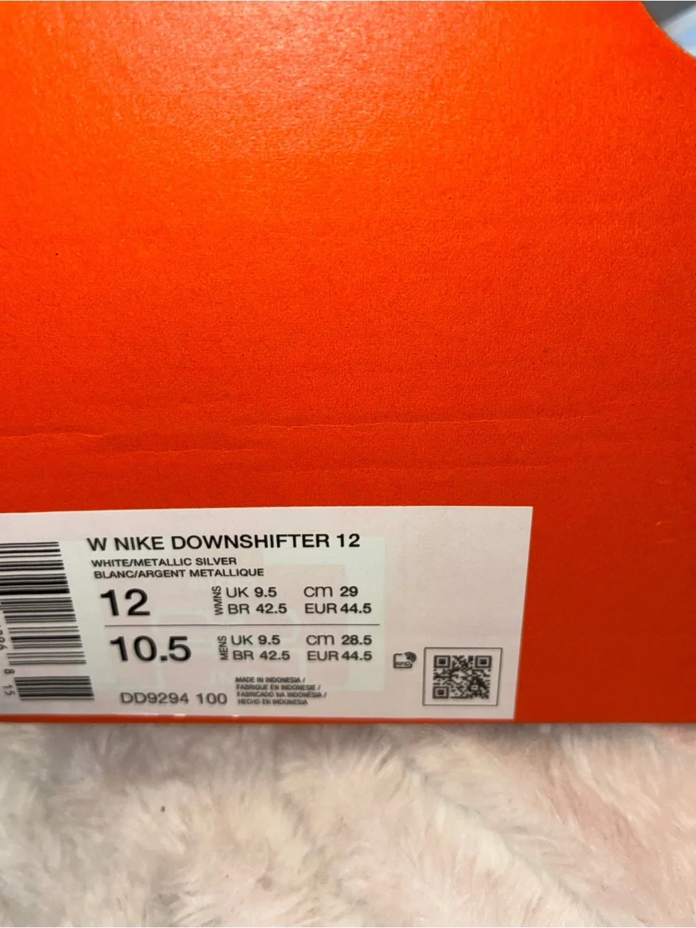 Nike Women's Light Gray Athletic Sneakers with Iridescent Swoosh